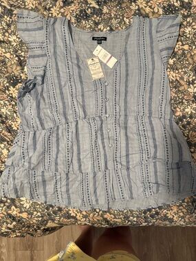 Women’s Light Blue Striped Button-Front Ruffle Hem Blouse